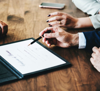 Person reviewing accounting certificate